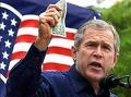 George Bush holding a dollar